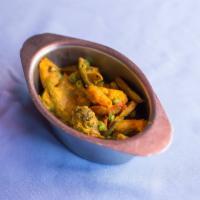 Mixed Vegetable Curry · A combination of fresh vegetable cooked in lightly spiced sauce.