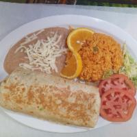 Breakfast Burrito  · 3 scrambles eggs, cheese, beans and your choice of meat rolled in a huge flour tortilla.