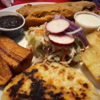 Salvadorian Tipical Plate · Plato tipico Salvadoreno. Popusa, chicken tamal, fried yuca, fried plantain, Salvadorian cre...