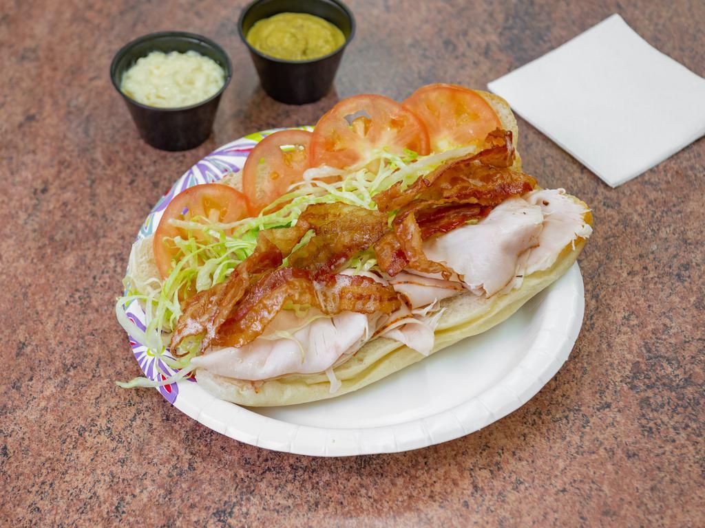 Turkey Club Hot Sandwich · Boar's Head Turkey breast, bacon, lettuce, and tomatoes.