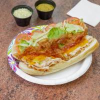 Ocean's Special Sub · Chicken breast grilled with bacon, melted cheddar, lettuce, and tomatoes.