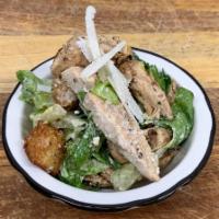 Grilled Chicken Ceaser Salad · Fresh chopped romaine lettuce, grilled chicken, and our house made croutons.
