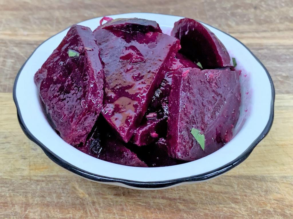 Beets Salad · Fresh sliced beets with red onions oil and vinegar herbs and spices.