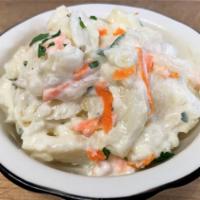 Potato Salad · Fresh potato, mayonnaise, sour cream, carrots, vinegar, herbs and spices.