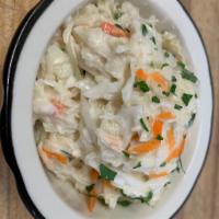 Cole Slaw · Cabbage, mayonnaise, sour cream, carrots, vinegar, herbs and spices.