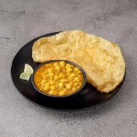 Channa Bhature · Large puffy white flour bread served with chickpeas curry. 