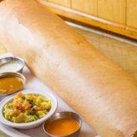 Paper Masala Dosa · Large, Thin, Crispy Crepe made with Rice and Lentil Flour; filled with Potato Masala