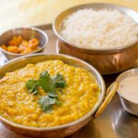 Dal Tadka · Yellow dal cooked on slow flame with onion, garlic & spices