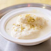 2 Piece Rasmalai · Cottage cheese in rose flavored milk and pistachio. 