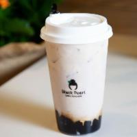 Taro Milk Tea · Taro flavored milk tea and brown sugar pearls