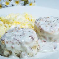 Country Breakfast · Buttermilk biscuits and homemade creamy gravy with scrambled eggs.(Gravy contains bacon bits.)