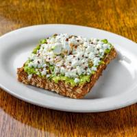 Avocado Toast · Mashed avocado and goat cheese on 7 grain toast, with a little sprinkle of crushed red peppe...