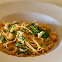 Chipotle Cream Pasta · Chipotle cream sauce, spinach and Parmesan cheese on top in penne pasta or linguini.