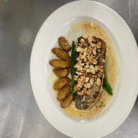 Trout Almondine · Sauteed filet of trout, French beans, toasted almonds.