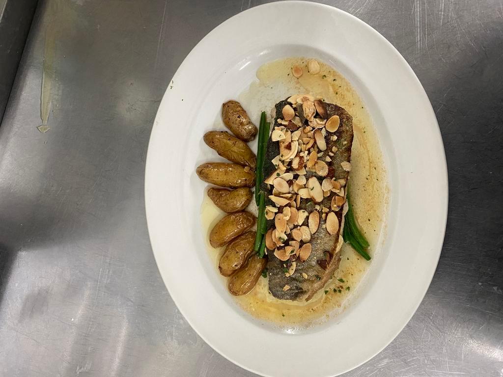 Trout Almondine · Sauteed filet of trout, French beans, toasted almonds.