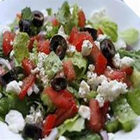 Greek Salad · Lettuce, tomato, onion, cucumber, olives and feta cheese.