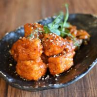 Crunchy Tofu · Tofu lightly fried in hot and spicy sauce