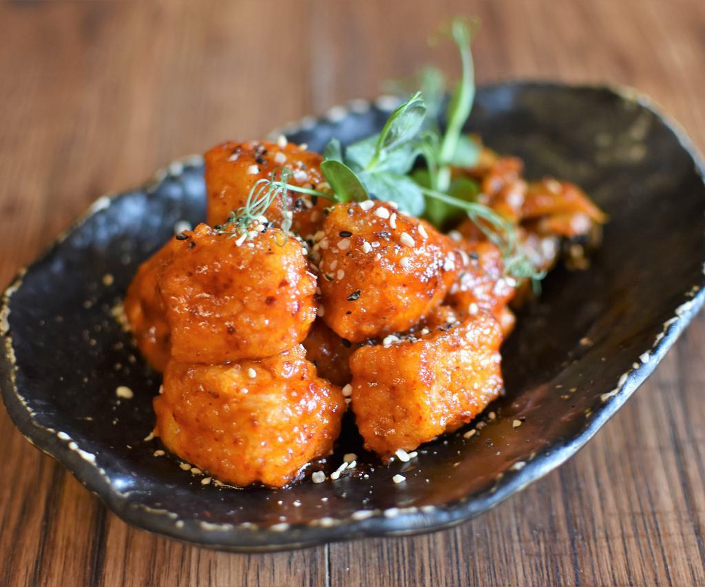 Crunchy Tofu · Tofu lightly fried in hot and spicy sauce