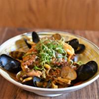 Seafood Japchae · {spicy} Napa cabbage, chinese broccoli, clams, shrimp and mussels. Sweet potato glass noodles.