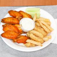 K6. 8 Piece Buffalo Chicken Wings with French Fries · Our specialty Buffalo chicken wings, served with blue cheese and celery sticks.