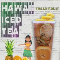 Hawaii Iced Tea · Tropical Fruit Flavor w. Black Tea, comes with Fresh Pineapple, Orange Slices, Lime in drink...