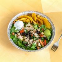 Taco Salad · Choice of chicken or steak, pico, sour cream, and guacamole, served on a bed of romaine lett...