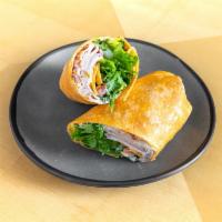 Club Wrap · Ham, turkey, bacon, provolone, cheddar, lettuce, tomato, and a honey mustard sauce wrapped i...
