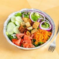 Garden Salad · Romaine lettuce, carrots, red pepper, red onion, tomato, cucumber and croutons choice of dre...