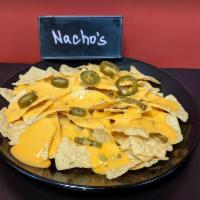 Nachos · Corn chips and nacho cheese.