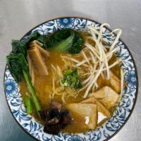 Vegan Ramen · Vegetable and shitake based broth with miso based motodare, truffle oil, tofu, choy sum, bea...