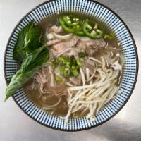 Beef Pho · Traditional Vietnamese Pho beef broth with thinly sliced eye of round, white and green onion...