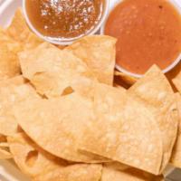 Chips and Sides · Locally made tortilla chips with our signature pico de gallo.