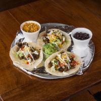 Traditional Tacos · Choose 3 of either crispy corn or soft corn, flour tortillas with selected ingredients.