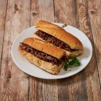 Cheesesteak Sandwich · Steak, cheese, and caramelized onion sandwich.