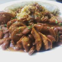 Red Beans Rice w/Sausage · Savory sausage simmered in red beans with steamed white rice.