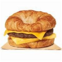 Sausage Egg & Cheese on Croissant Breakfast · Finely chopped or ground meat, often mixed with seasoning. A flaky French pastry.