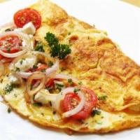 Tomato Cheese Omelette with Home Fries Platter · Beaten eggs that are folded over a filling. Soft cooked diced potatoes.