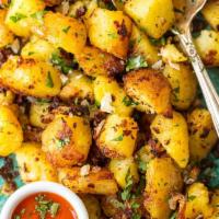 Home Fries · Soft cooked diced potatoes.