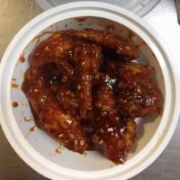 A8. Chicken Wings with Garlic Sauce · Hot and spicy.