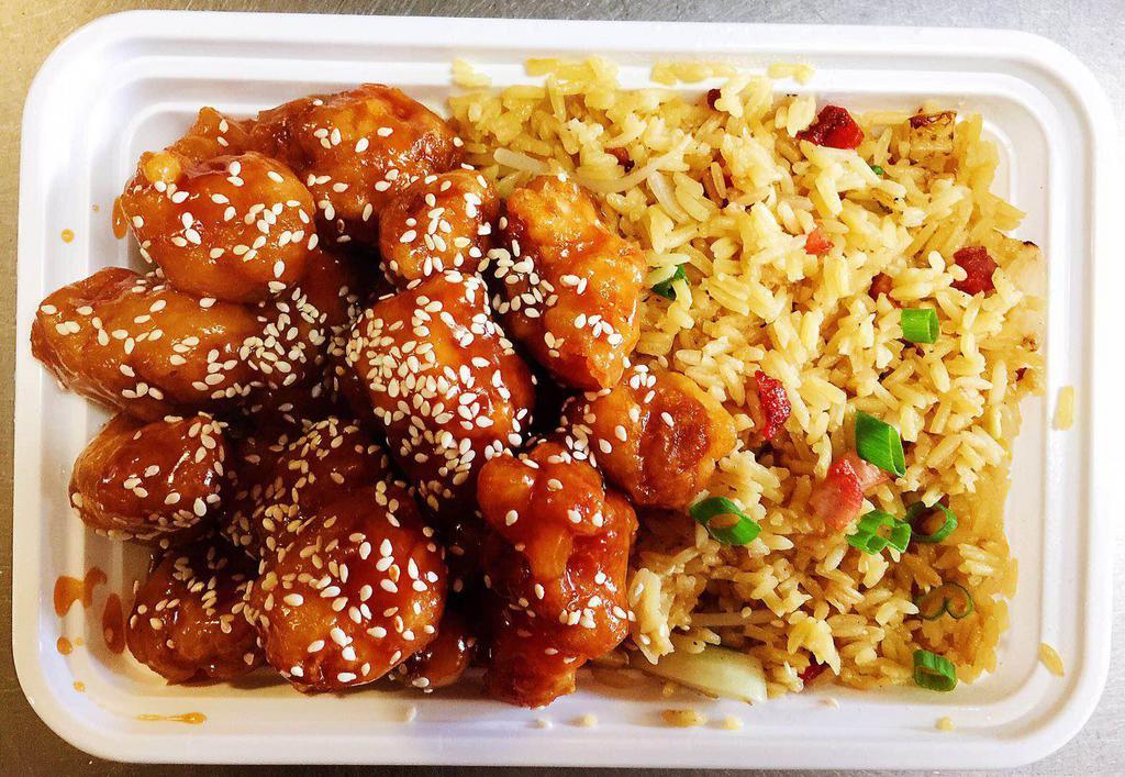 C14. Sesame Chicken Combination Dinner · Served with pork fried rice and pork egg roll.
