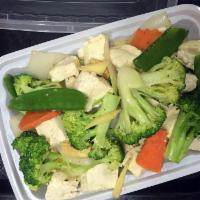 D12. Vegetarian Paradise · All kind of vegetable sauteed with soft bean curd. Sauteed with only ginger and garlic. No s...