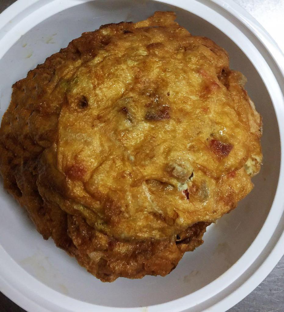 Egg Foo Young · Served with white rice.