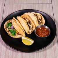Street Tacos · Grilled chicken or steak. 3 soft corn tortillas topped with lime, diced onions and cilantro....