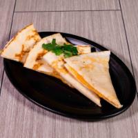 Cheese Quesadilla · Grilled tortillas with cheddar and Jack cheese. Served with sour cream, guacamole and pico d...
