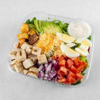 Cobb Salad · Fresh mixed greens, chopped hard-boiled eggs, tomatoes, bacon, Monterey Jack and Cheddar che...