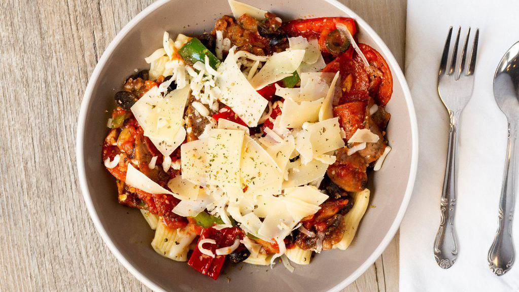 Supremo Pasta · Rigatoni with bell peppers, black olives, mushrooms, pepperoni, and Italian sausage, all tossed in marinara topped with Parmesan cheese, Mozzarella cheese, and pizza seasoning.