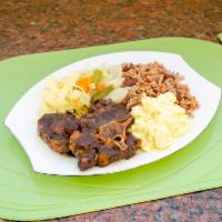 Oxtails Dinner · Includes your choice of 2 sides.