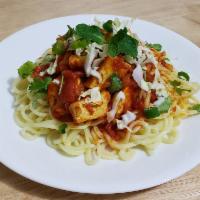 15. Tofu Noodle Salad (Vegan) · Yellow noodle mixed with Soy Tofu curry, garnished with carrot, cilantro and green onion wit...
