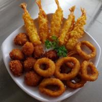 18. Asean Fritto Misto · Seafood: Fried tempura and butterfly shrimp, squid ring and scallop. Served with sweet chili...