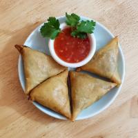 19. Samusar (Vegan) · Potato, onion and spices wrapped in crispy and crunchy wrap. (4 pieces)
(Burmese Style) 